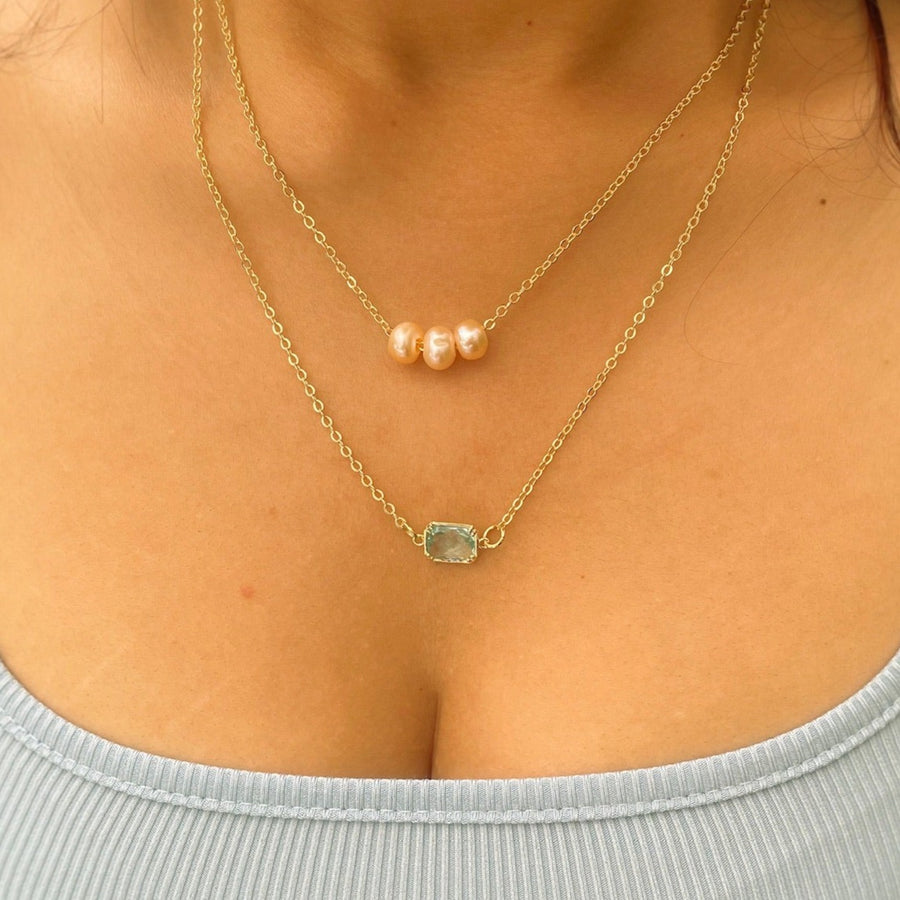 Layered pearl and gem necklace